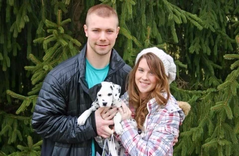 Lee and his wife with Remy as a Dalmatian puppy